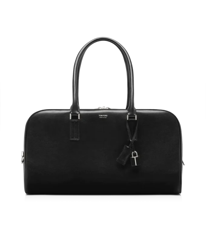 Geschmeidige Bowlingtasche aus genarbtem Leder mit doppeltem Reißverschluss Geschmeidige Bowlingtasche aus genarbtem Leder mit doppeltem Reißverschluss