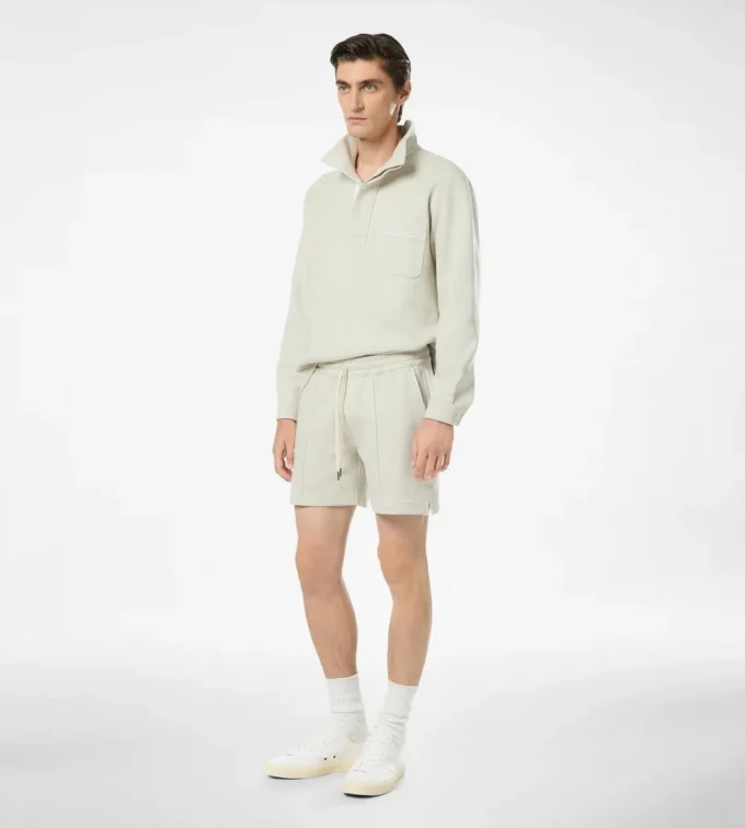 Halbknopf-Pullover aus Baumwolle, Seide und Kaschmir Halbknopf-Pullover aus Baumwolle, Seide und Kaschmir