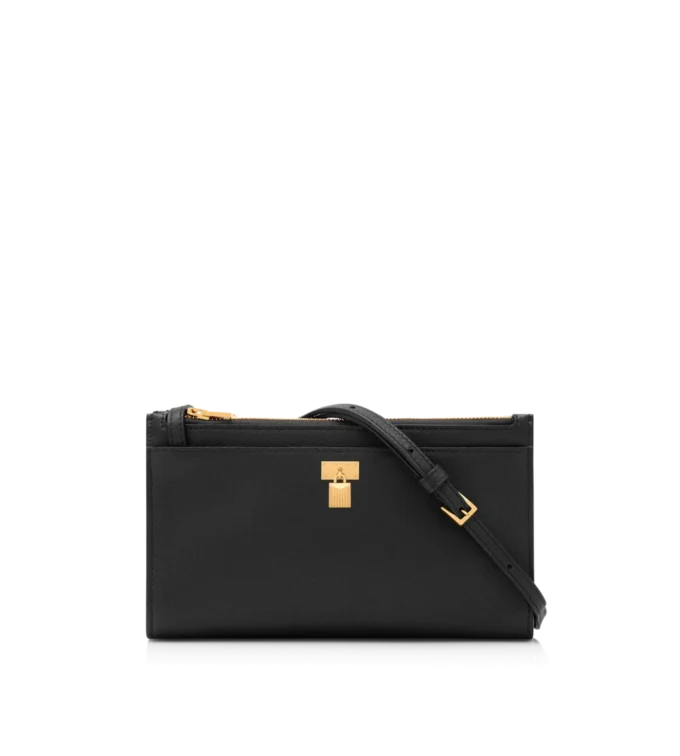 Mini-Tasche aus naturbelassenem Leder mit Vorhängeschloss und Riemen Mini-Tasche aus naturbelassenem Leder mit Vorhängeschloss und Riemen