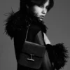 Mini-Tasche Tara aus genarbtem Leder mit Riemen Mini-Tasche Tara aus genarbtem Leder mit Riemen