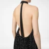 Seiden-Halterneck-Abendkleid mit Sunray-Plissee und Lederdetails Seiden-Halterneck-Abendkleid mit Sunray-Plissee und Lederdetails