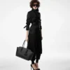 Trenchcoat mit Lederunterkragen Trenchcoat mit Lederunterkragen