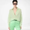 Ultraweiches Oversize-Strickoberteil aus Kaschmir und Seide mit offenem Polokragen Ultraweiches Oversize-Strickoberteil aus Kaschmir und Seide mit offenem Polokragen