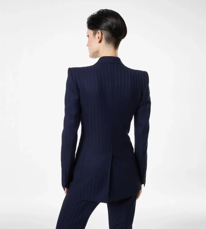 Zweifarbige Jacke aus reiner Wolle mit doppelter Knopfleiste und Spitzkragen Zweifarbige Jacke aus reiner Wolle mit doppelter Knopfleiste und Spitzkragen