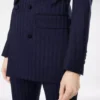 Zweifarbige Jacke aus reiner Wolle mit doppelter Knopfleiste und Spitzkragen Zweifarbige Jacke aus reiner Wolle mit doppelter Knopfleiste und Spitzkragen