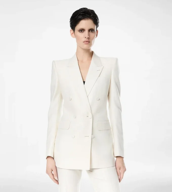 Zweireihige Jacke aus Wolle und Seide mit Schattenstreifen und Spitzkragen Zweireihige Jacke aus Wolle und Seide mit Schattenstreifen und Spitzkragen