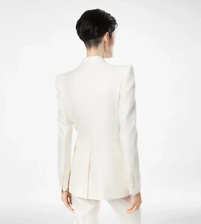 Zweireihige Jacke aus Wolle und Seide mit Schattenstreifen und Spitzkragen Zweireihige Jacke aus Wolle und Seide mit Schattenstreifen und Spitzkragen